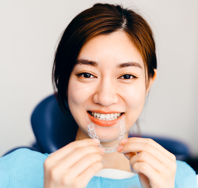 woman with invisalign