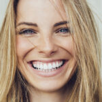 beautiful woman smiling, cosmetic dentistry checklist