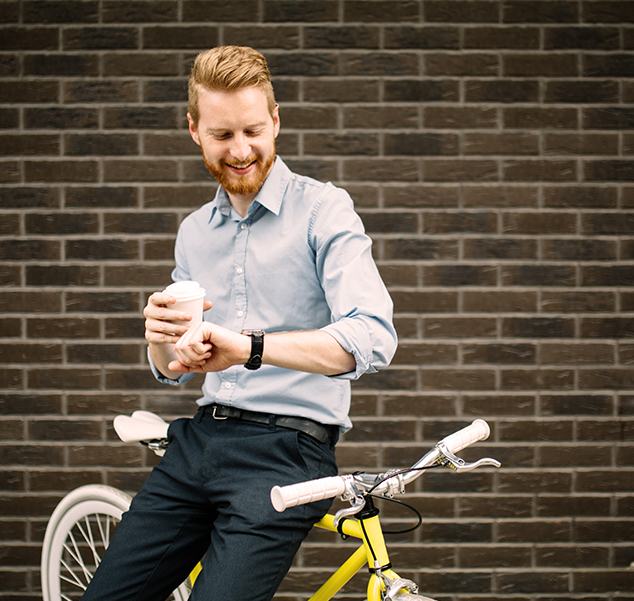 man looking at watch