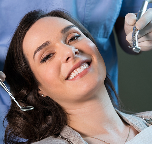 smiling woman at the dentist