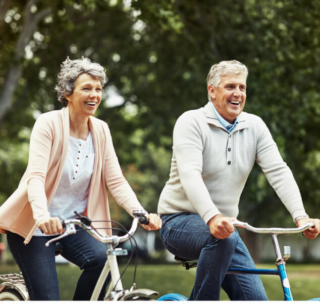 senior couple riding bikes